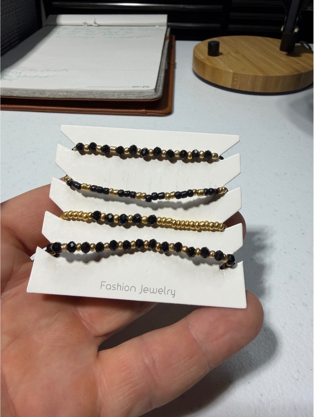Fashion jewelry beaded bracelet set black and gold tone